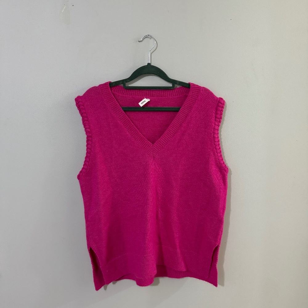 Pink sweater vest